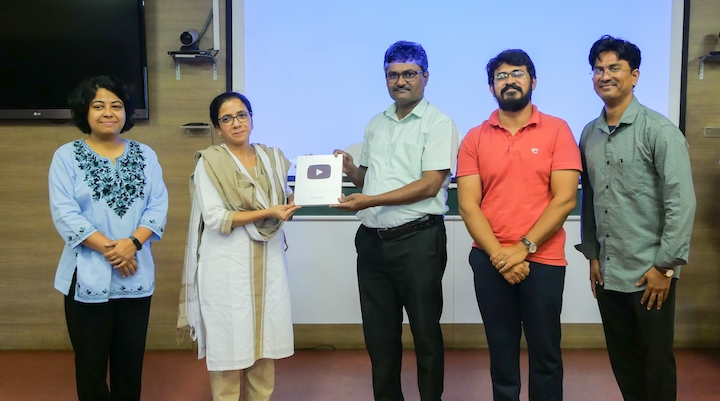 Five members connected to the Science Activity Centre with the Award