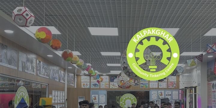 a representative image of the Kalpakghar space with displays of paper models of various shapes from the ceiling